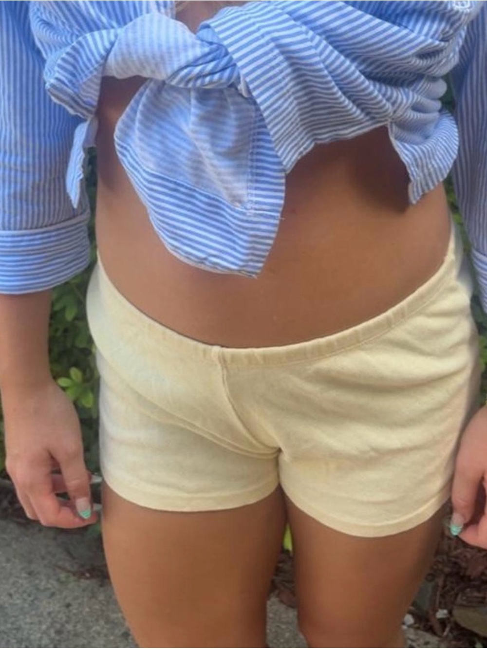 BRANDY MELVILLE EMERY EYELET SHORTS IN YELLOW
